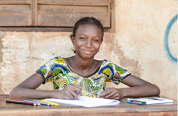 Girl studying in Africa